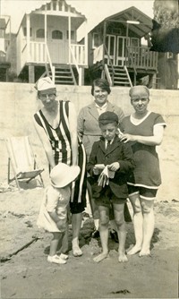 Beach huts and bathing costumes at Frinton-on-Sea, 1920s